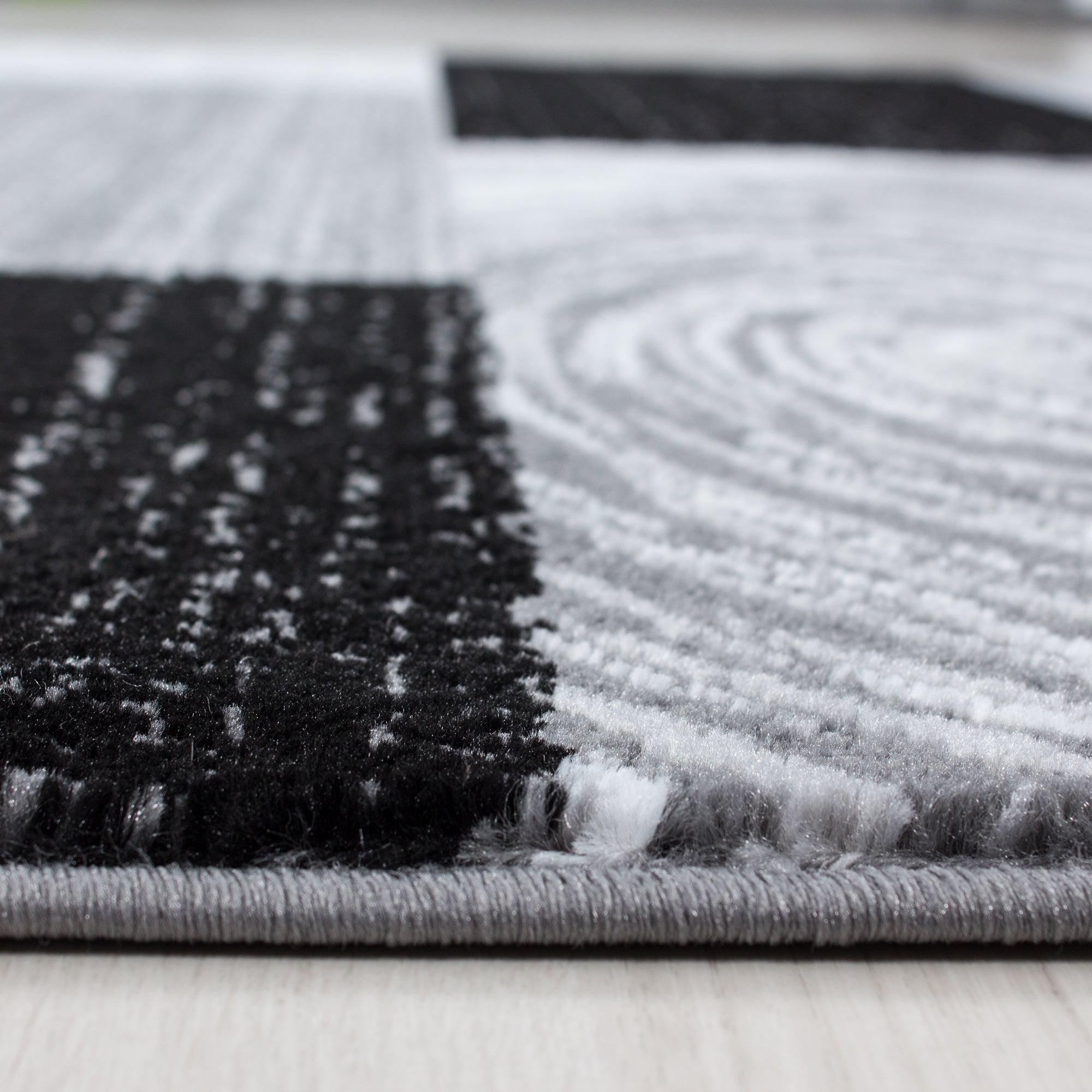 Teppich Kurzflor mit Muster - moderner Designer Teppich - abstraktes Muster Karo Patchwork - Schwarz Grau Meliert
