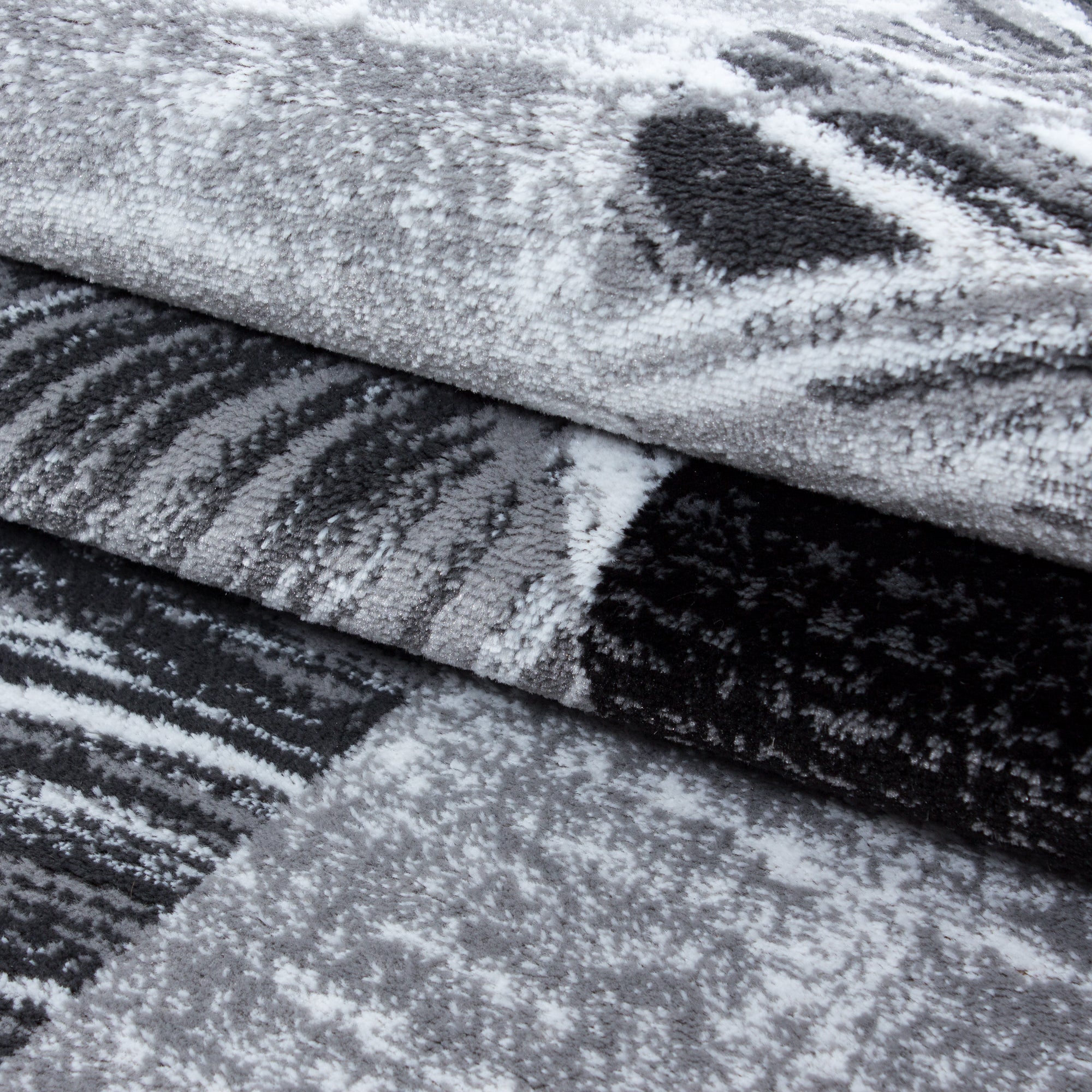 Teppich Kurzflor mit Muster - moderner Designer Teppich - abstraktes Muster Karo Patchwork - Schwarz Grau Meliert